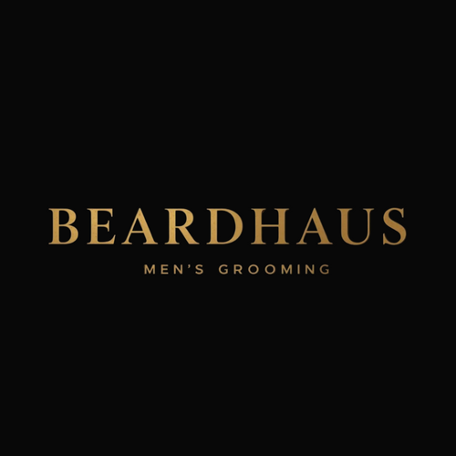 Beardhaus Men's Grooming logo in gold on a black background